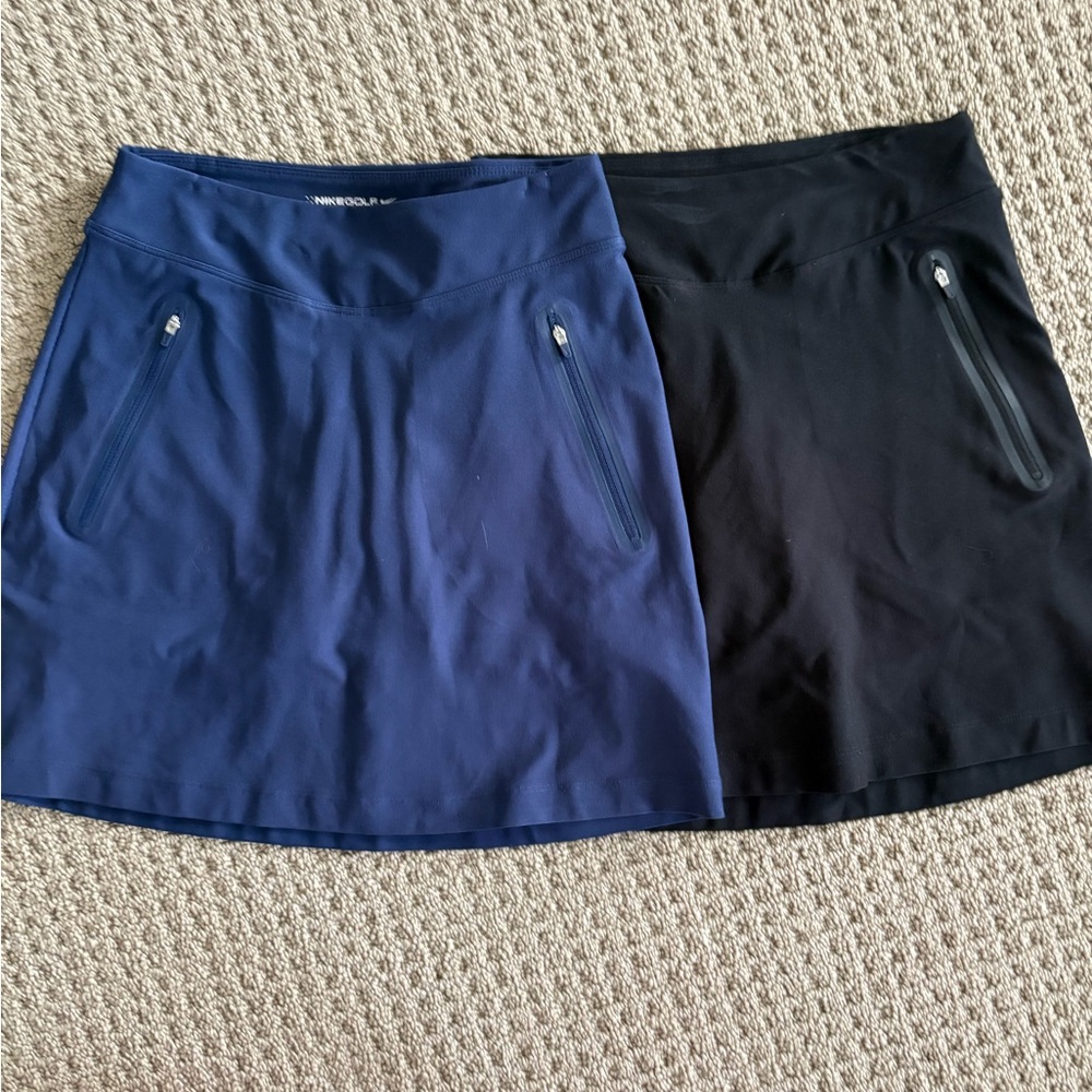2 womens Nike golf skirts